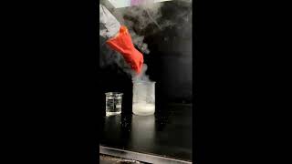 Why shouldn't water be added to acids?