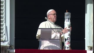 Pope lights one of thousands of candles for worldwide campaign for Christians in Syria