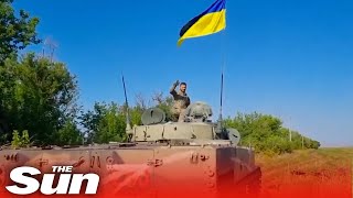 Ukrainian troops capture and fly flag from Russian Z tank