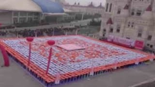 Students form world's largest 'human' QR code