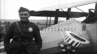 United States 94th Aero Squadron officers stand in front of an aircraft in France...HD Stock Footage