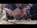 indian woman transferring the powdered bajra millet into the... indian stock footage knot9