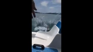 Guy Randomly Falls as His Friend Attempts a Back Jump Into Water