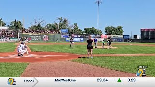 Weather Intern Jax Stelzer Throws the First Pitch at the Kernels Game