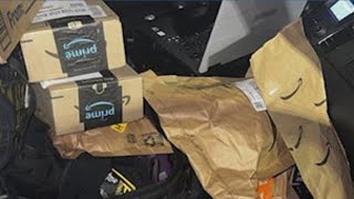 Athens Clarke County police play Santa delivering abandoned packages
