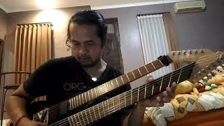 Balawan - playing fanned fret guitar playing bass and guitar at the same time