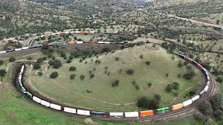 Follow UP Intermodal from Tehachapi side of tunnel 10 to a full view of the train looping the loop.