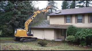 2 Story House Turns to Splinters in Minutes. POV Time Lapse Segment from the Cockpit of the CAT 312E