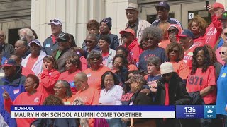 Maury High School alumni take one last photo before the building is repurposed