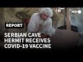 Serbian cave hermit receives Covid-19 vaccine | AFP