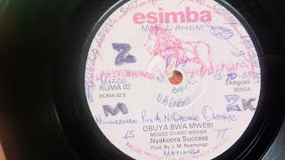 NYAKOORA SUCCESS BAND .OBUYA BWA MWEBI.BY MOSES OYARO MEMBA.ESIMBA 02 SIDE B.