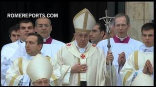 Pope Francis greets Benedict XVI before start of canonization ceremony