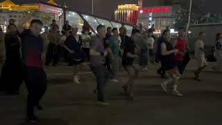 青羊宫跳弦子的三个青年.Three boys danced Xianzi Gorshey on Qingyang Plaza.