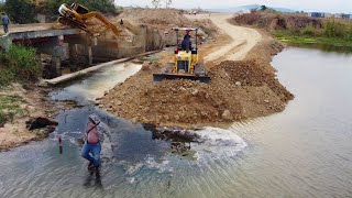 Incredible! Dump Truck Loading Stone Filling Flooded Lake Along Old Bridge For Build a New Bridge.