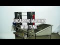 uncapping machine with mannual feeder with a tank