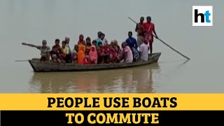 Watch: People commute via boats as floodwater enters residential areas in Bihar