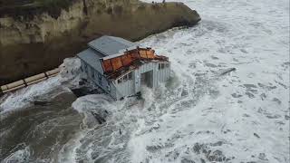 Flooded bathrooms washed off wharf in Santa Cruz (Drone POV)