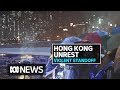 Hong Kong protesters try to break out of besieged university | ABC News