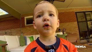 This 2-year-old can name Denver Broncos players by their cards