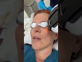 Dr. Laria receiving her dry eye treatment with Lumecca IPL.