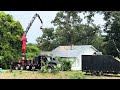 Beautiful 120+ year-old oak tree being cut down by robotic crane saw.