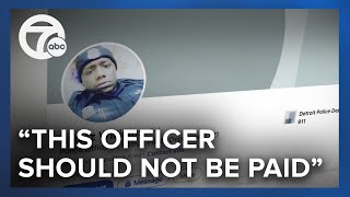 Why was this officer getting paid while sitting in jail?