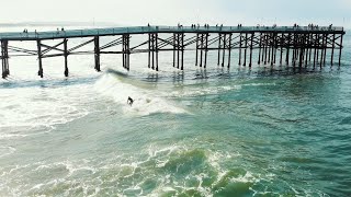 Surfing PB Pier San Diego