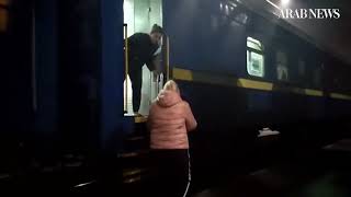 Crowds pack Kyiv's railway station as thousands of people, many foreigners, try to leave