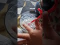 girl making bubbles with milk