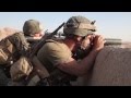 US Marines observe enemy in Sangin Afghanistan 2010