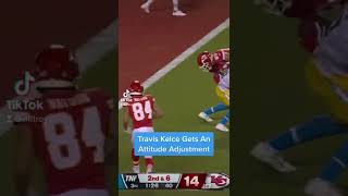 Travis Kelce Gets an attitude adjustment from Derwin James during the Thursday Night Football Game.