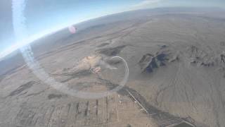 Wingsuit flight through giant smoke rings