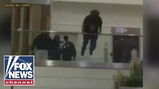 Shocking video: Man jumps over railing at Atlanta airport