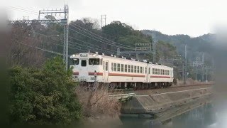 梅にキハ40系　夜明けの参宮線江川橋梁に鶯の声