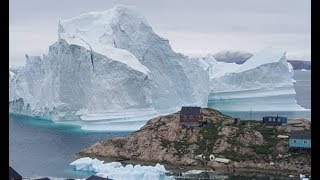 Massive iceberg threatens Greenland village as residents are evacuated
