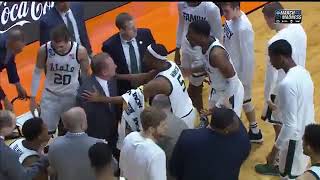 Tom Izzo restrained while berating Aaron Henry