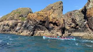 Cornish Pilot Gig Ginette from Tamar\u0026Tavy gig club, rowing through the Twll on Ramsey Island