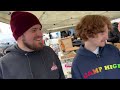 two white guys try making deals at a swap meet