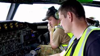 Maintenance crew of RAAF AP-3C Orion Maritime patrol aircraft