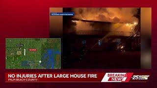 Massive fire erupts in Palm Beach County home
