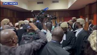 WATCH: Emefiele 'Hides Face' As He Appears In Abuja Court