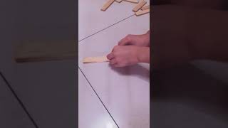 How to make a Kapla rubber band which explodes when you stepped it
