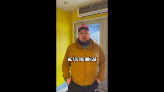 Greenland man throws on a MAGA hat and tells Donald Trump to buy the territory.