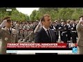 French President Emmanuel Macron pays homage to WWI Unknown Soldier at the Arc de Triomphe