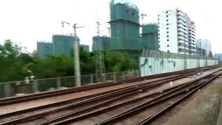 {CNR} No.1203 passenger train passing Huizhou West Station (惠州西站)