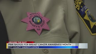 Pitt County Sheriff's Office wearing pink badges during Breast Cancer Awareness Month