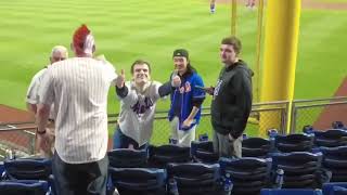 Phillies fan throws Mets fan’s phone onto the field