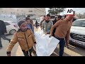 prayers at gaza hospital for mother father and child killed in israeli airstrike