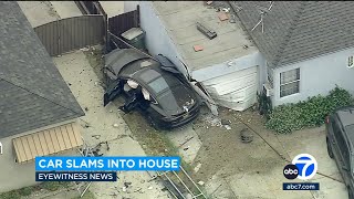 Video captures Tesla lose control and crash through garage of Burbank home
