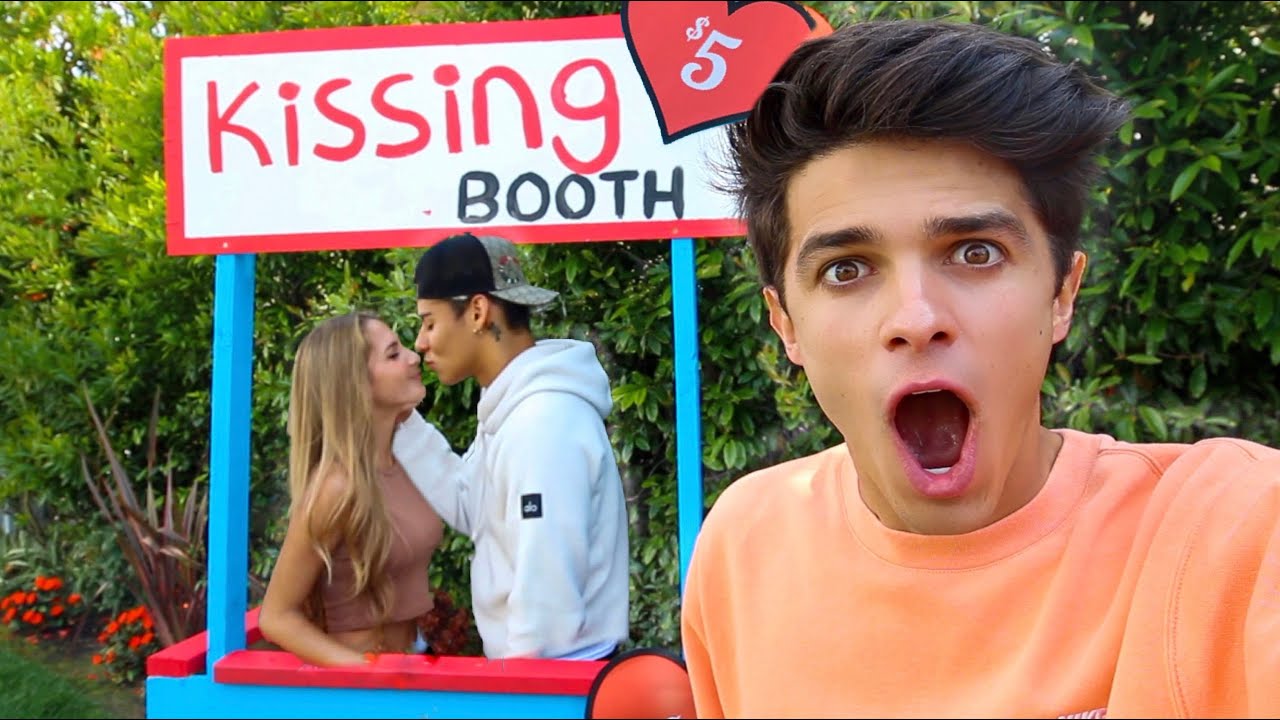 MY LITTLE SISTER OPENED A KISSING BOOTH!!